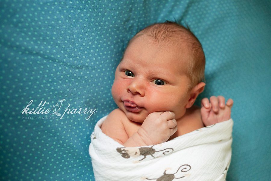 sticking his tongue out