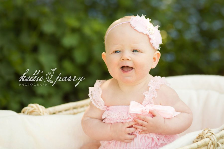 baby girl in pink pettiromper