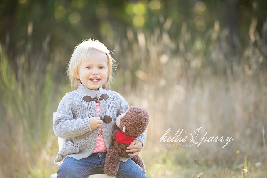 little girl with stuffed animal