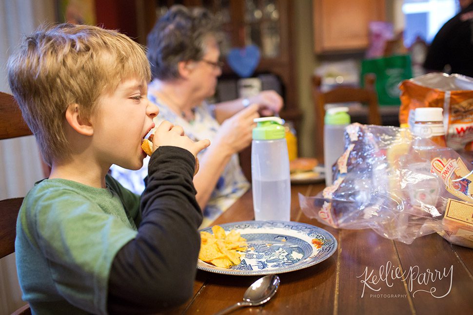 boy eating a hamburger