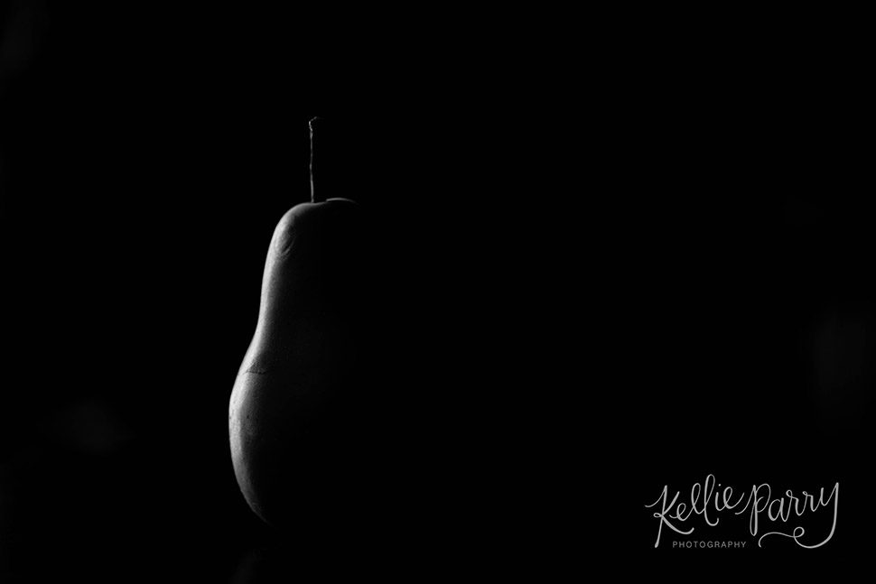pear in dramatic lighting