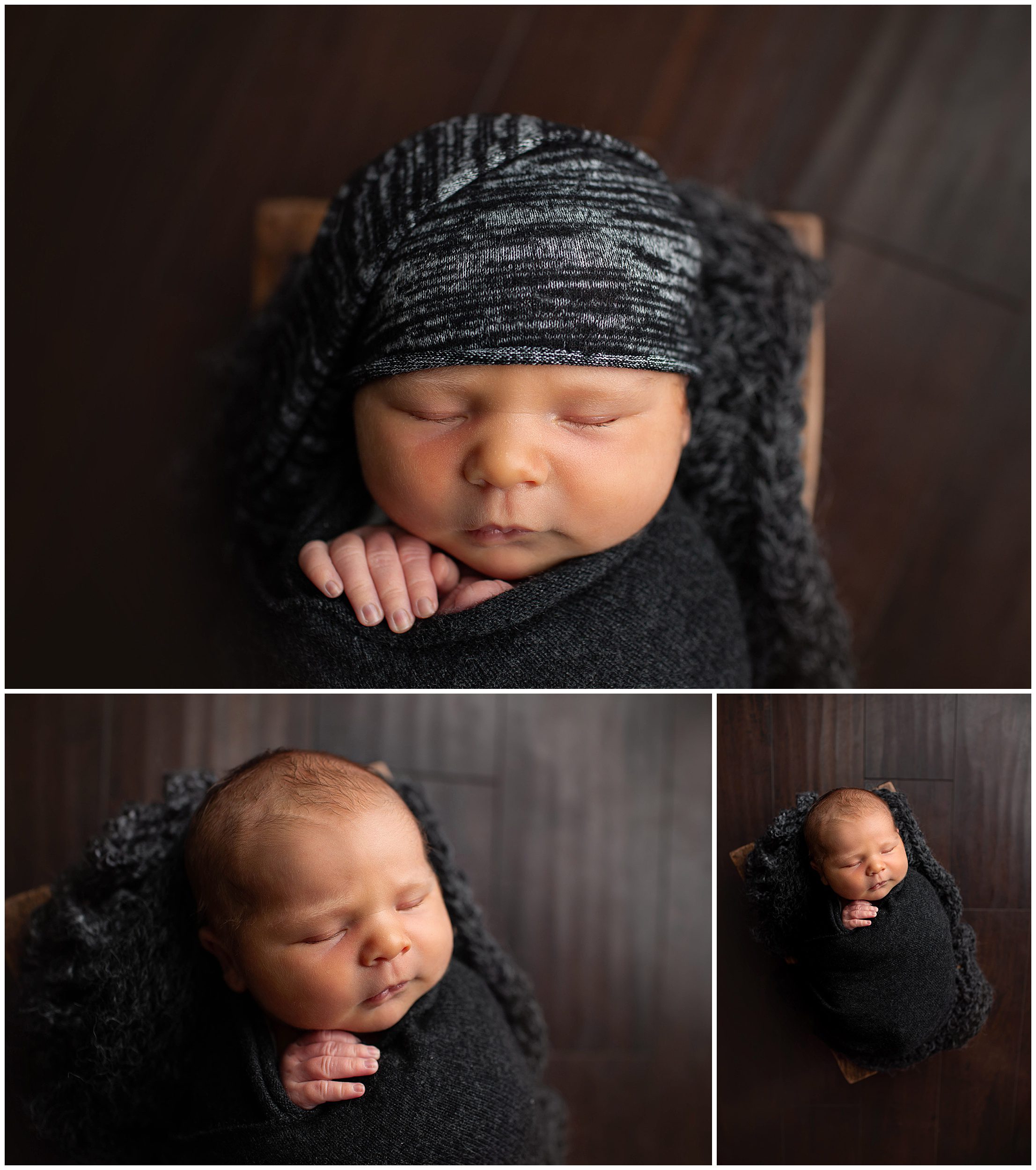 newborn photos of baby baby in dark gray