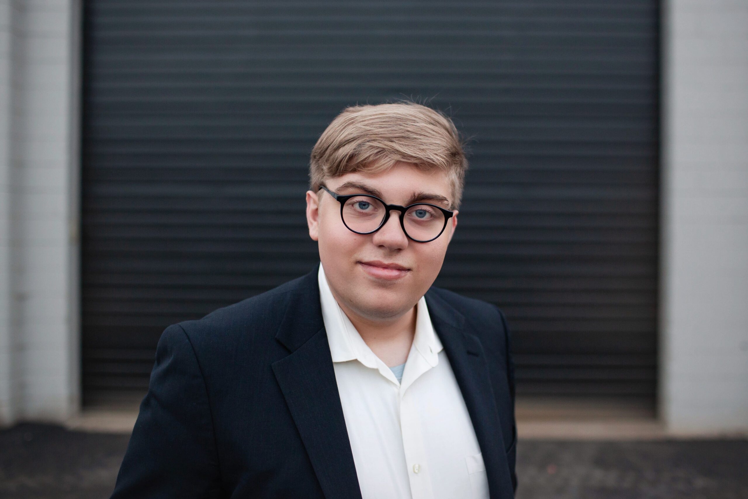 senior boy portrait wearing a suit in Salem